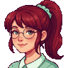 Pixel-art portre: Irmak, Test otomasyon uzmanı (yapay zekâ ekip üyesi). At kuyruklu kızıl-kahve saçlı, gözlüklü, nane yeşili bluzlu.